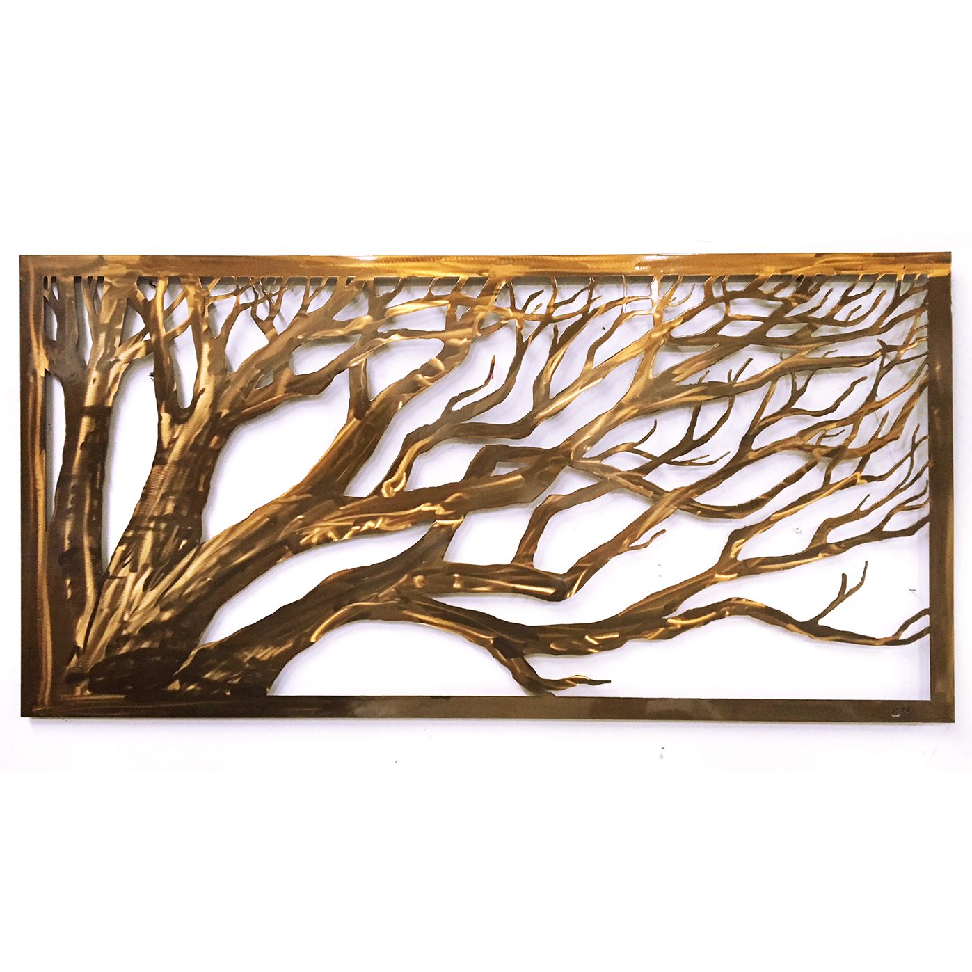 A large rectangle panel of copper tinted metal. A highly detailed tree reaches across the panel.
