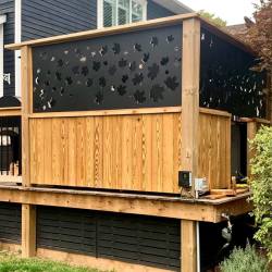 The metal maple leaf screens from the neighbour's view.