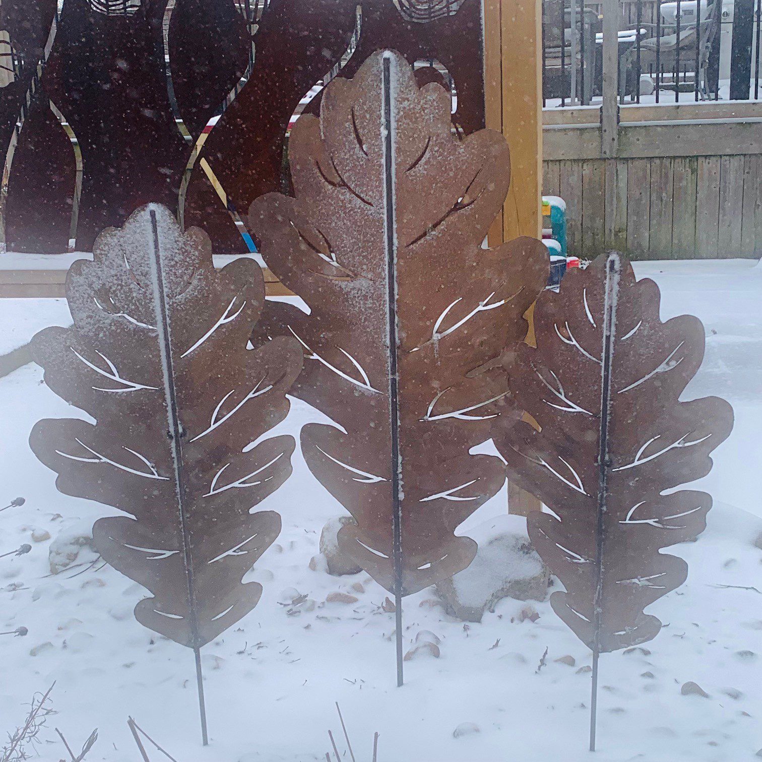 A set of 3 Metal oak leaf sculptures for your garden, around 4 ft tall. Made from sheet metal and rod.