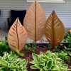 A set of three large metal leaf sculptures for your garden. Artistically cut veins give these leaves a modern personality.